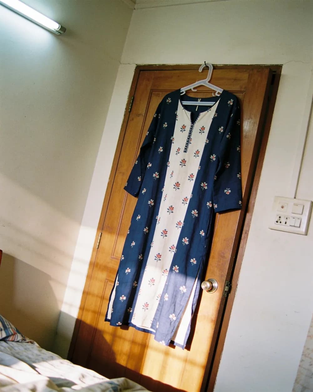 Phone photo of a kurti on a hanger